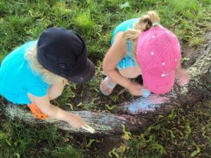 chalking on trees 