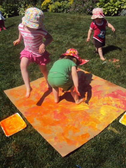 Happy Hooligans painting with their feet