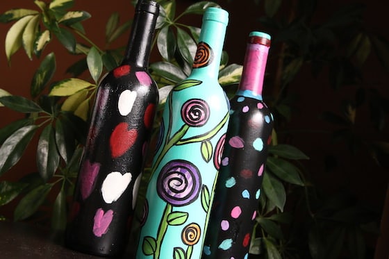 3 painted wine bottles