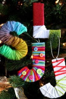 yarn wrapped initial ornaments on Christmas tree - feature image