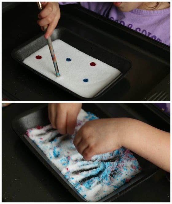 Adding food colouring to the salt tray