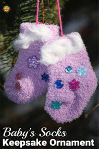 baby socks turned into tiny christmas stocking ornament