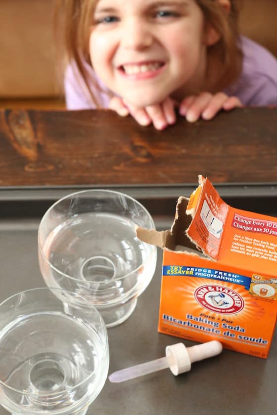 baking soda and vinegar on a baking sheet