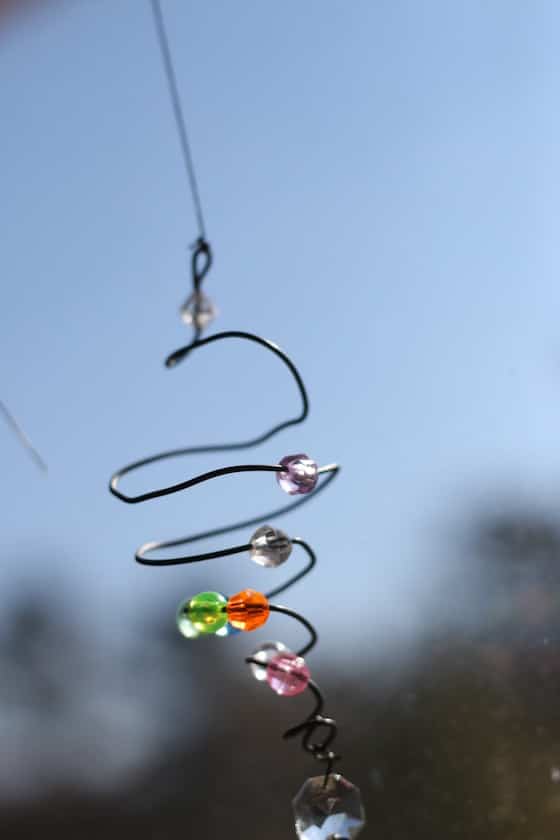 beads on wire spiral in the sun