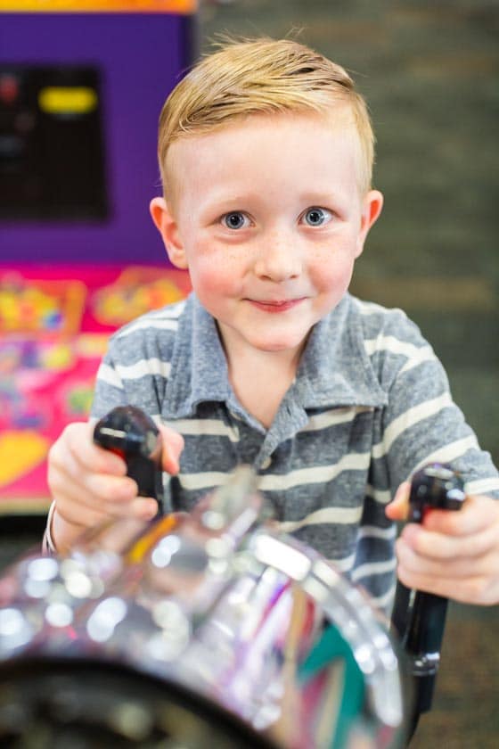 Birthday Boy playing games at Chuck E. Cheese's