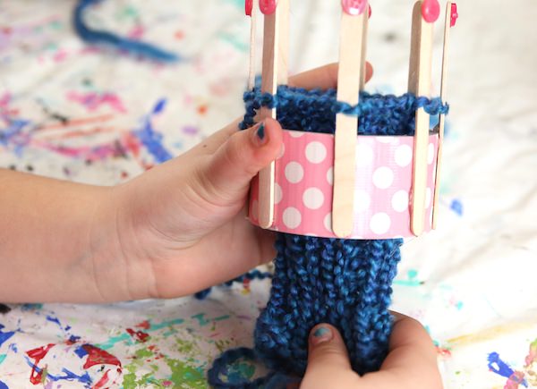 blue glove on duct tape loom