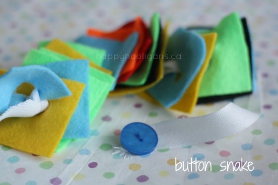 button snake with felt squares on the ribbon 