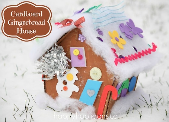 cardboard gingerbread house decorated by toddlers and preschoolers