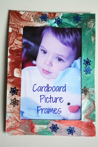 red and green homemade cardboard picture frame with photo of little boy