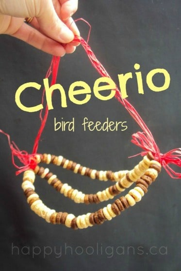 Cheerio and pipe cleaner bird feeder with red raffia