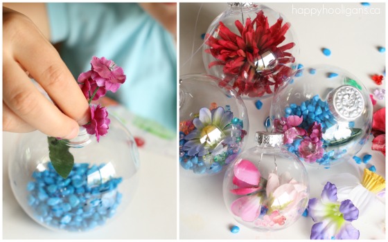 child filling clear plastic ornaments with beads and flowers