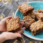 Child holding oatmeal chocolate chip bar