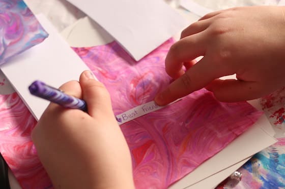 Child writing fortune message