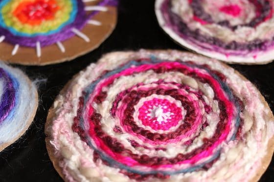 Close up circle weaving in pink yarns