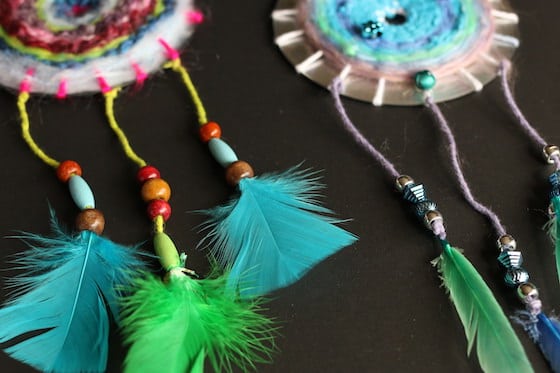 Closeup feathers and beads on CD dreamcatchers