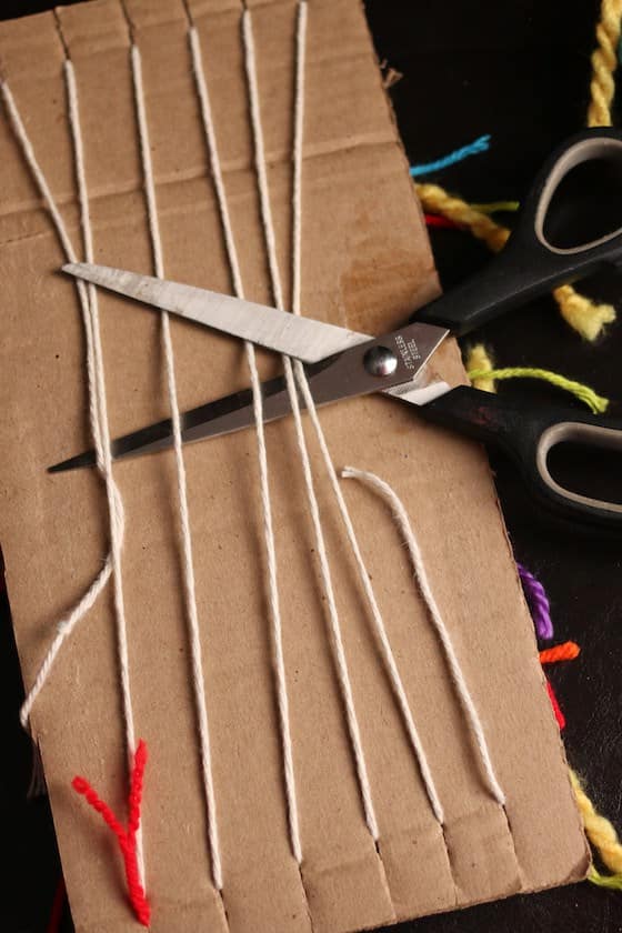 cutting strings weaving loom