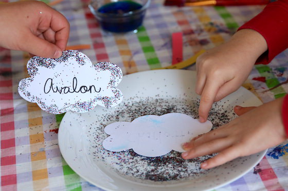 Dipping paper cloud in glitter