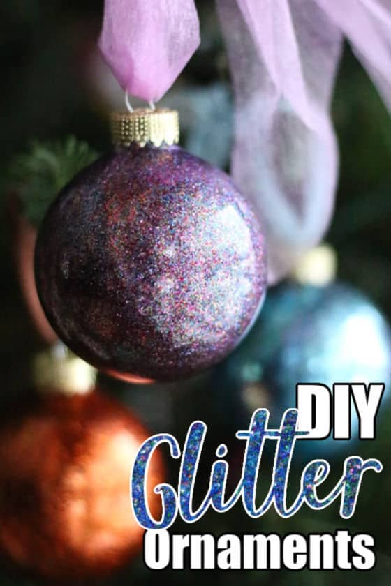 DIY Glitter Ornaments made with clear plastic balls, hairspray and glitter