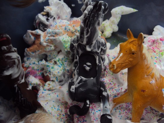 fisher-price farm animals in shaving cream and glitter