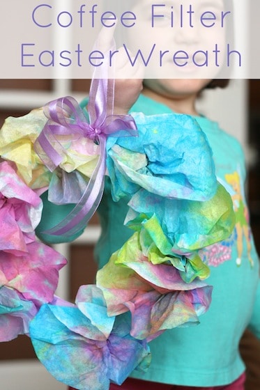 Kids spring wreath for Easter made with coffee filters and paper plates.