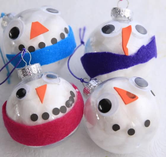 4 snowman ornaments made with clear glass balls