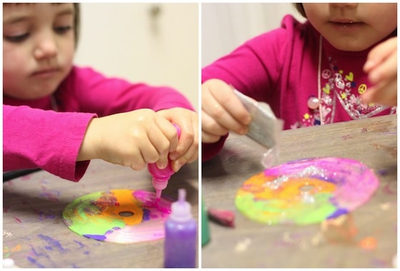 glitter glue and glitter on a cd