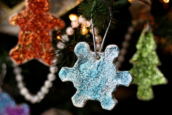 Glittered ornaments on tree