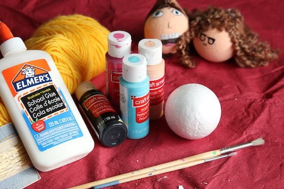 glue, paint, yarn, paintbrushes, styrofoam ball