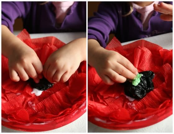 gluing centre on crepe paper poppy craft