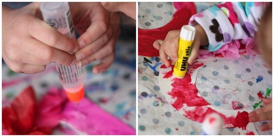 gluing tissue paper to cardboard hearts