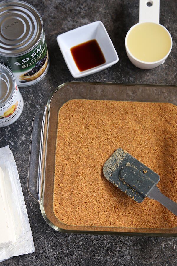 graham cracker crust pressed into 9x9 glass baking dish 