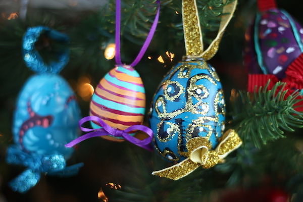 4 painted eggs on Christmas tree