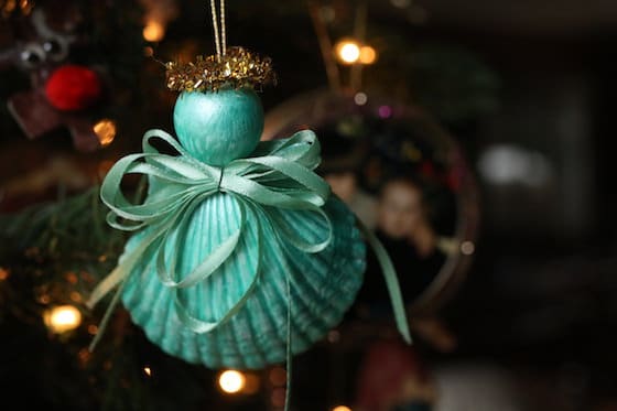 Painted seashell angel ornament on Christmas tree