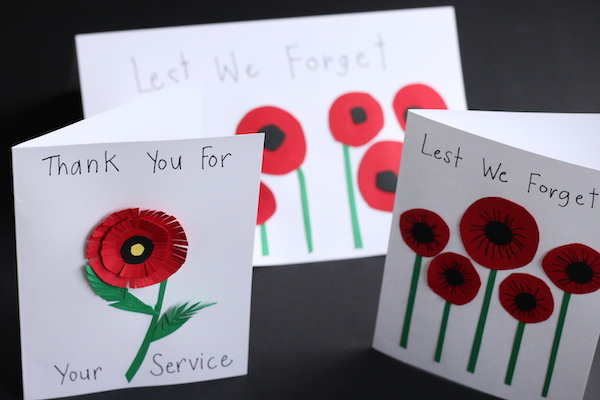 homemade remembrance day cards with circle poppies standing upright 