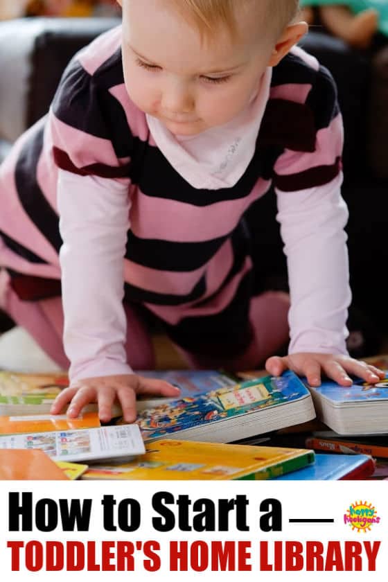 Toddler looking at books