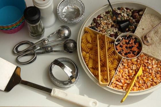 instruments and ingredients for mud kitchen activity