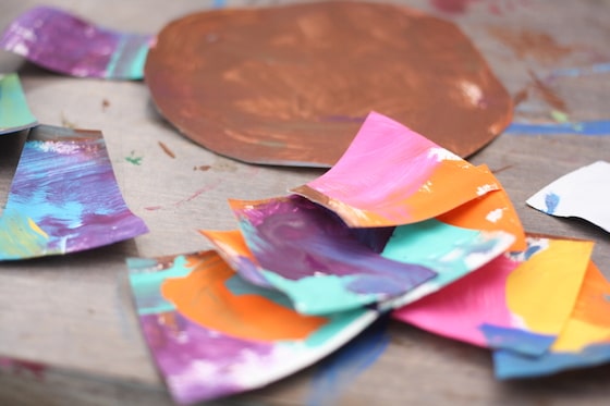 paper plate cut into pieces for body and feathers 