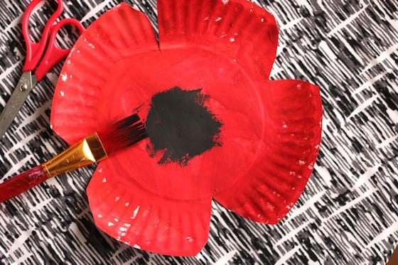 paper plate cut into poppy shape