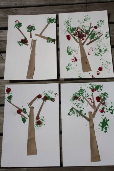 apple tree craft made with sandpaper, corks and aluminum foil