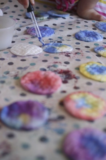 Dripping watercolours onto cotton pads