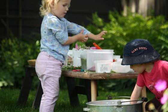 making Sensory Soup with fresh herbs and flowers