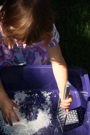 grating the ivory soap to make fairy mud