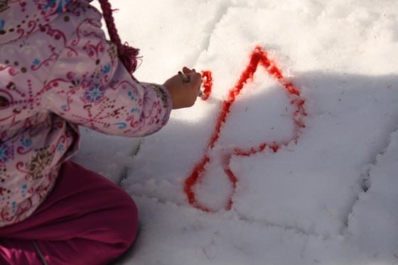 painting letters in the snow