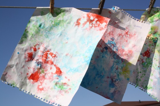 bubble paintings hanging to dry on clothesline