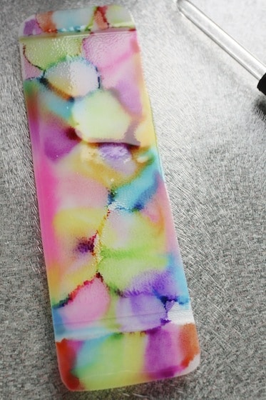 rubbing alcohol and sharpies on a plastic bookmark