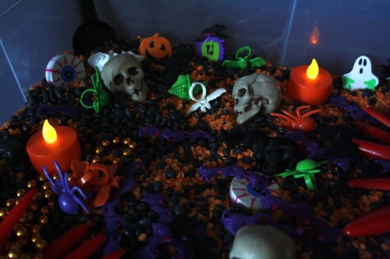 Halloween Sensory bin with battery tea lights