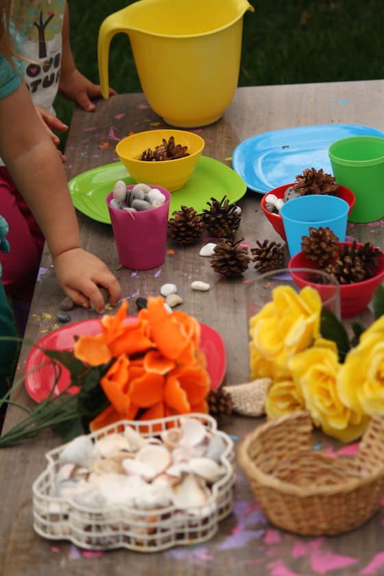 tea party with natural items and fake flowers