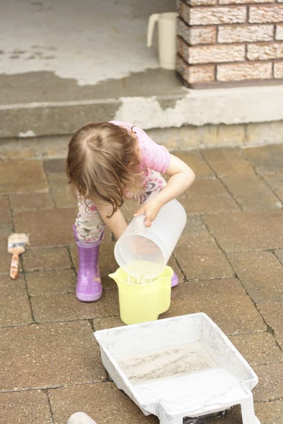 child pouring water