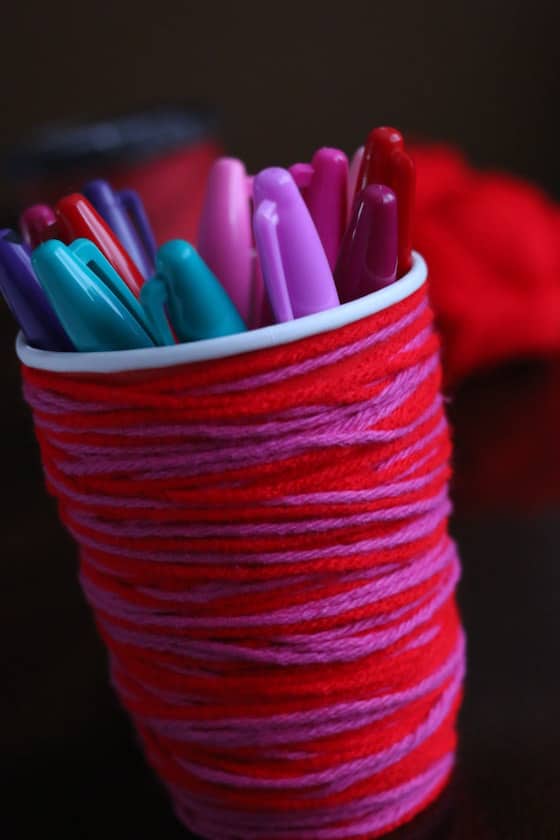 Sharpie markers in wool-wrapped coffee cup pen holder