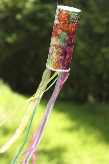 homemade windsock hanging in tree